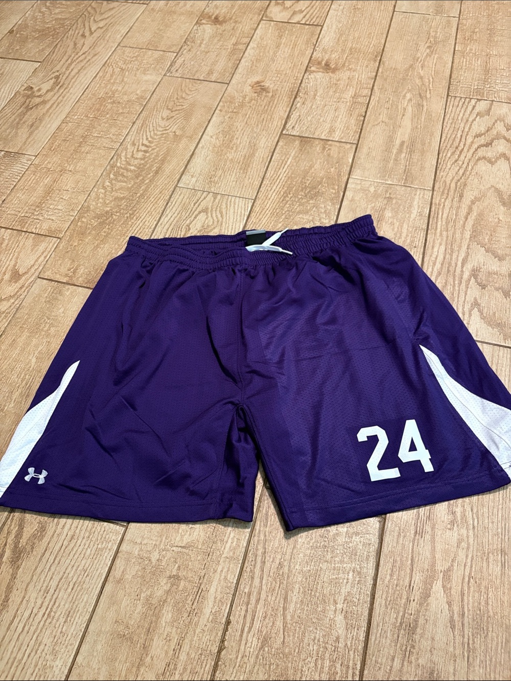 Under Armour Men’s Purple Athletic Shorts with White Accents and Number 24